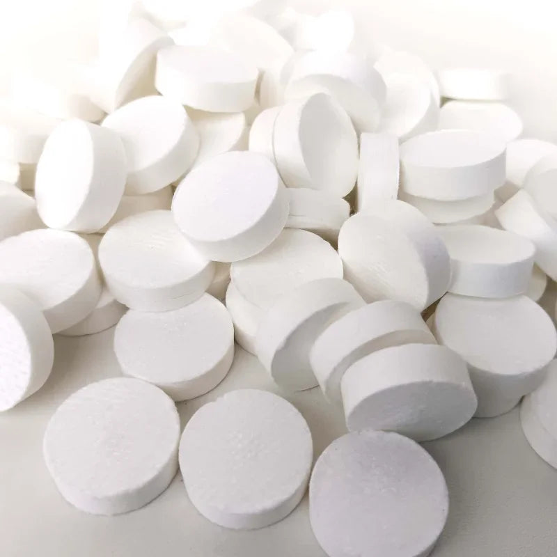 100PCS Mini Compressed Towel Capsules for travel versatility - Ideal compressed tissue tablets for face care routines.