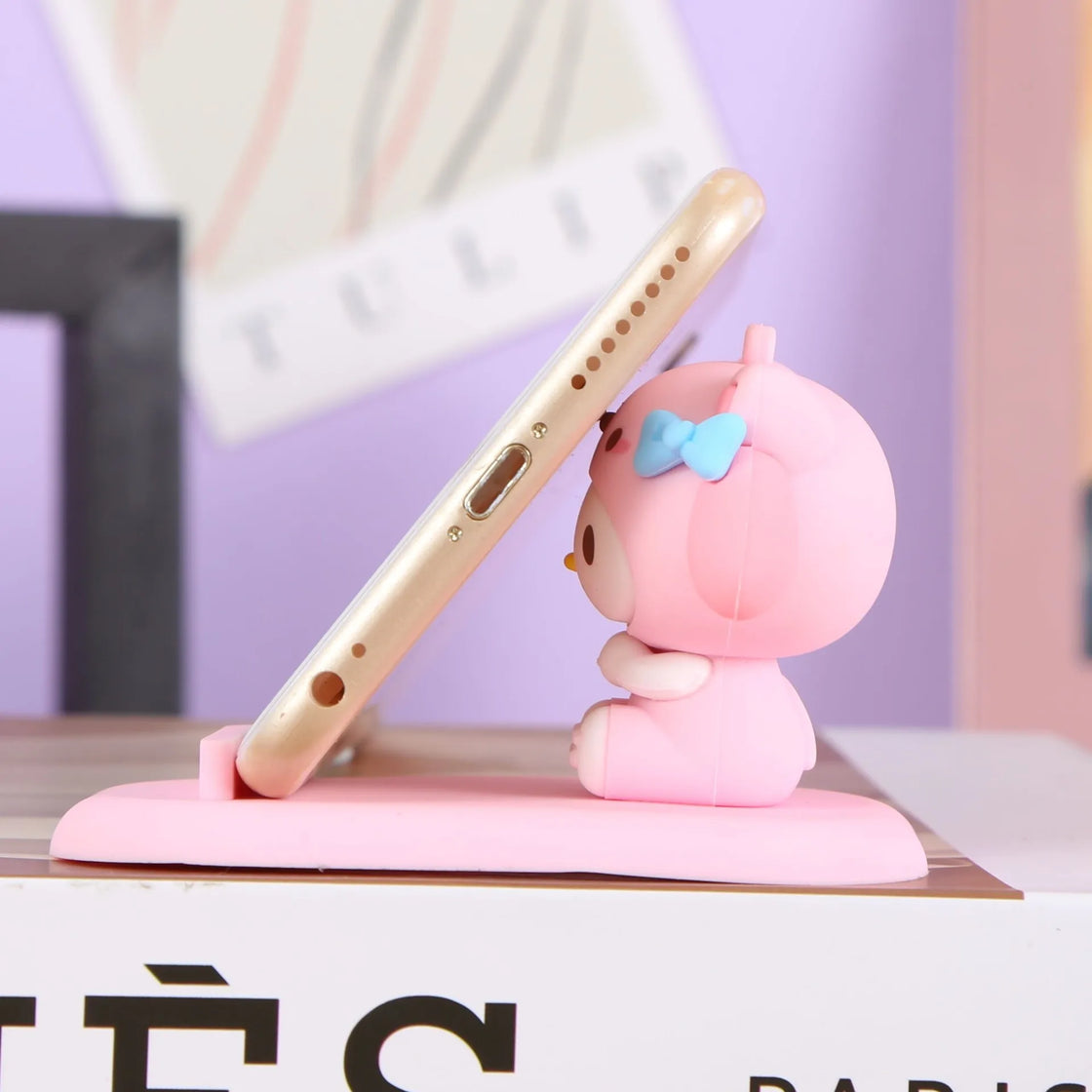 Stylish Hello Kitty phone holder and desk decoration that adds a touch of kawaii charm to your room.