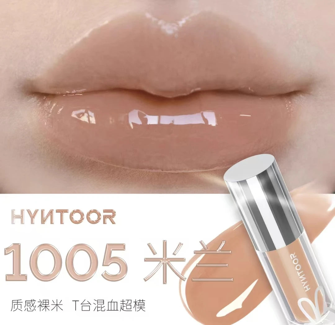 High-energy image of applying HYNTOOR Lip Gloss, your go-to shiny lip gloss for dry lips.