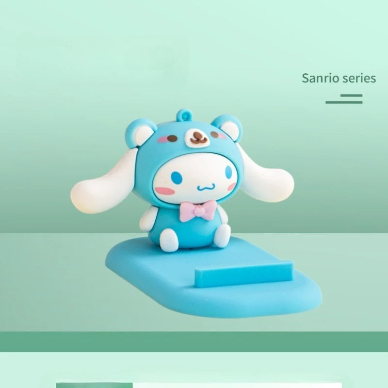 Kawaii Hello Kitty phone holder with friends, enhancing your workspace with cute and functional decor.