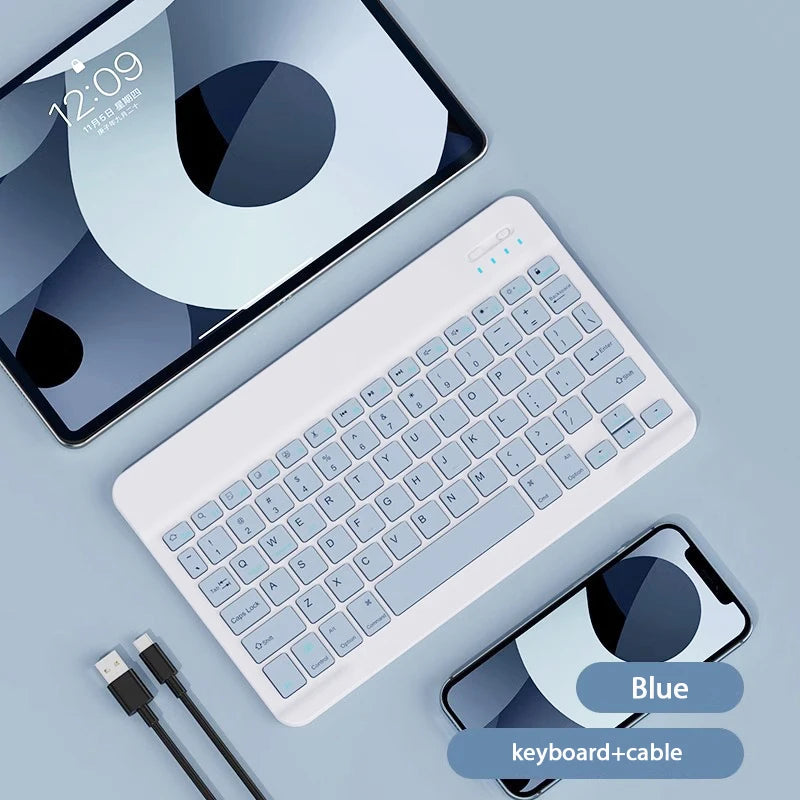 White keyboard and mouse set for iPad 2024, featuring a Bluetooth keyboard by Orbit Gear.