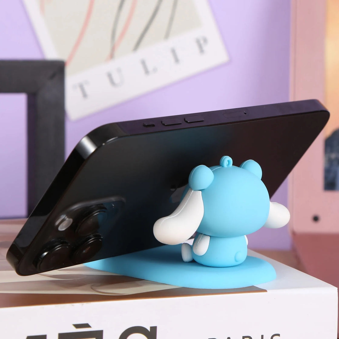 Cute Hello Kitty phone holder and desk decor from Sanrio, ideal for organizing your workspace.