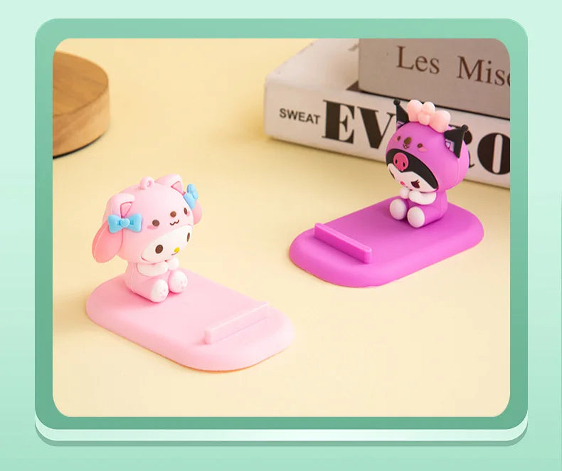 Hello Kitty-themed phone holder that doubles as stylish desk decor, bringing joy to any workspace.